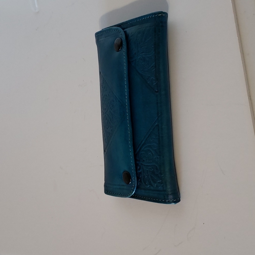 Compact turquoise wallet with beautiful texture
